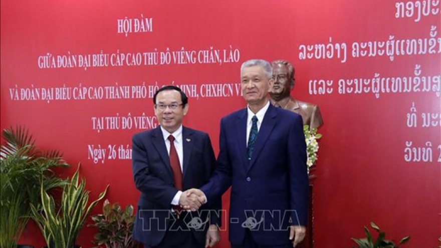 HCM City, Lao capital step up cooperation